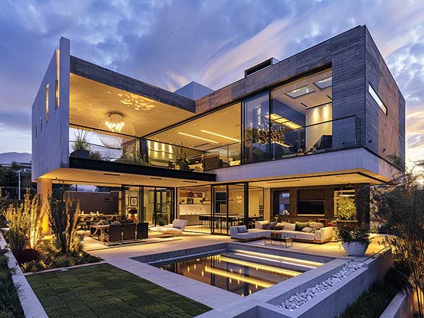 Vivienda de diseño moderno reformada con estilo contemporáneo por Inteco Construcción en Barcelona